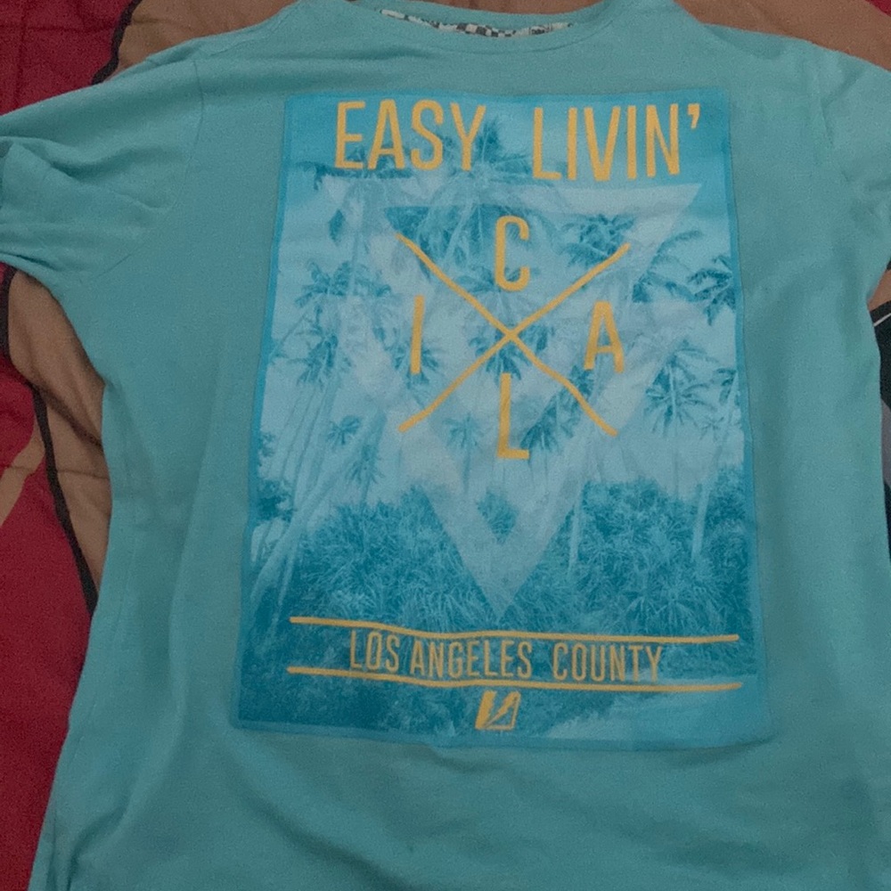 Shirt of mine doesn't fit me anymore. It size L 14-16